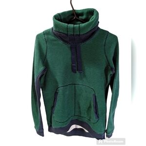 Lululemon turtle neck with pulled strings.  Green and black striped.